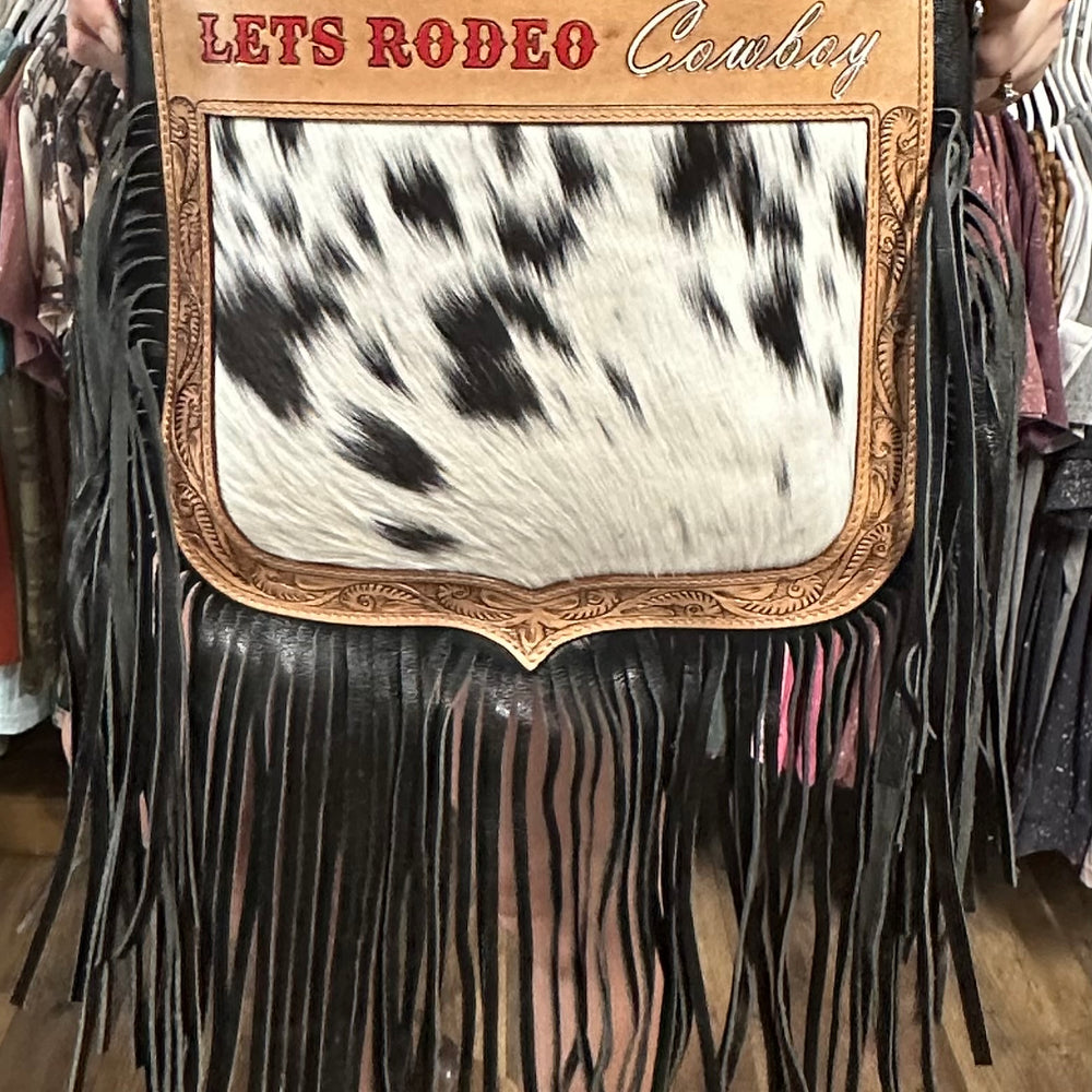 
                      
                        Let’s Rodeo Cowboy Cowhide Fringe Bag
                      
                    