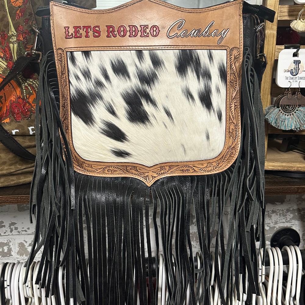 
                      
                        Let’s Rodeo Cowboy Cowhide Fringe Bag
                      
                    